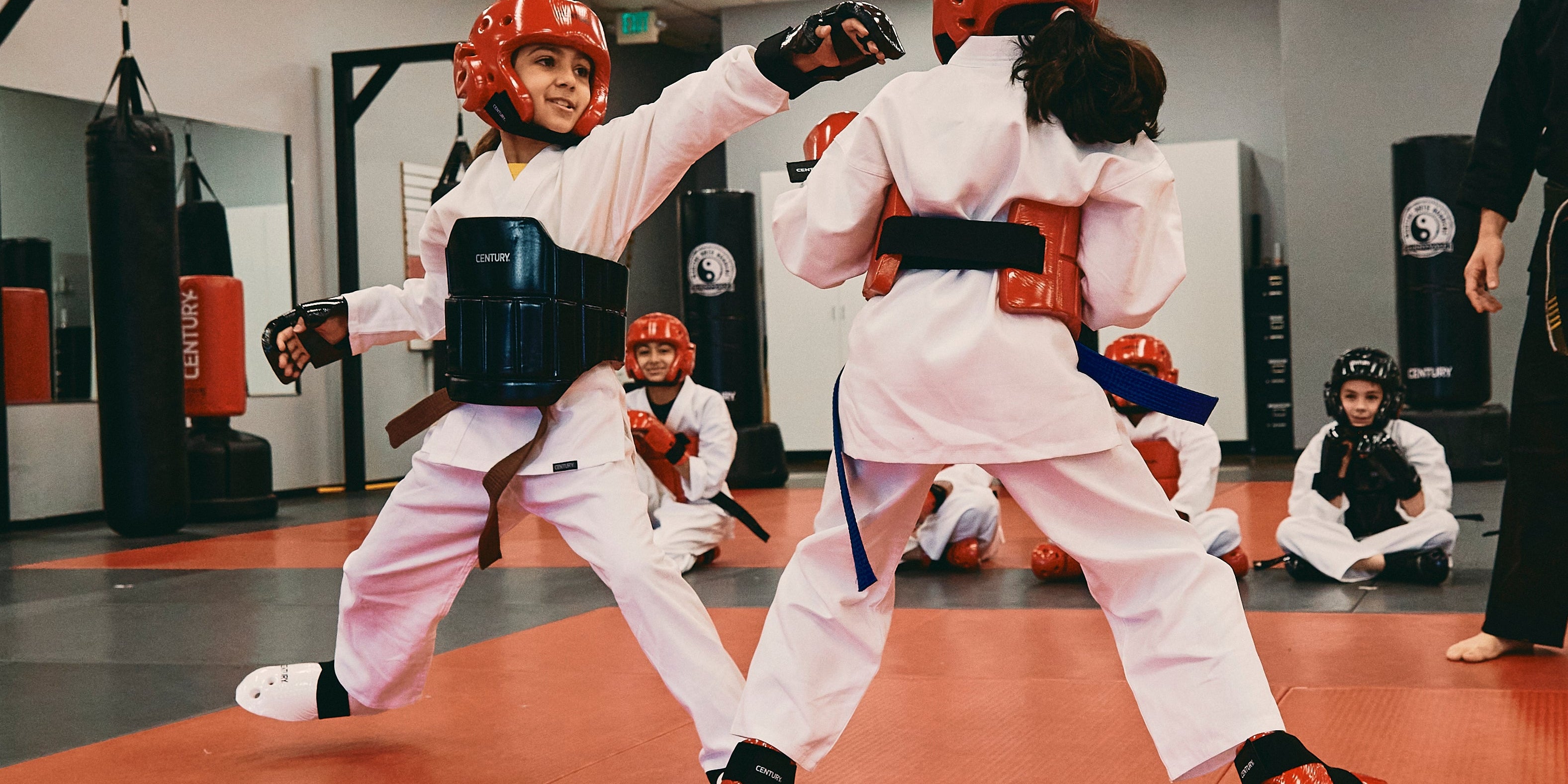 children training in martial arts class
