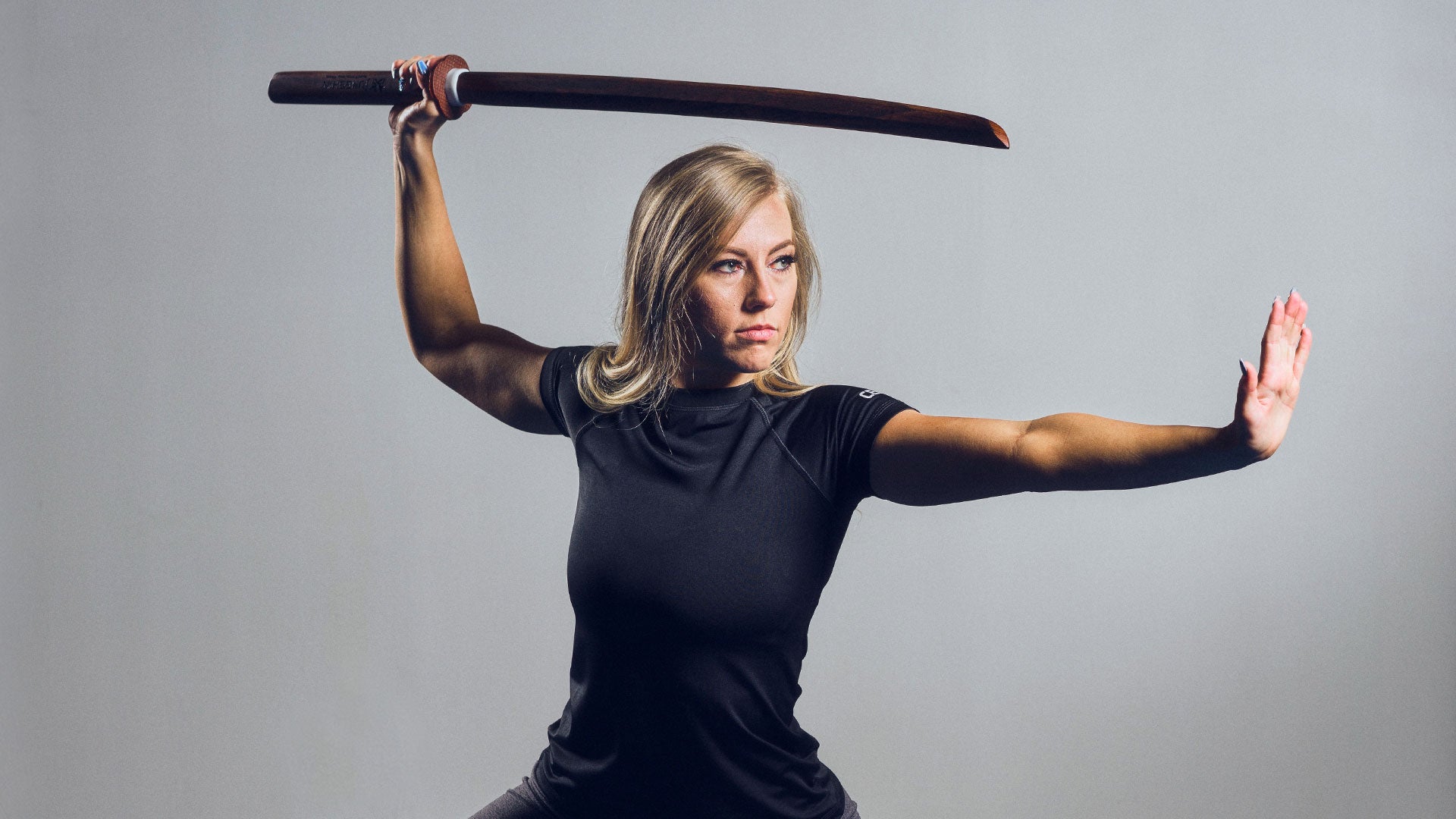 Woman training with bokken