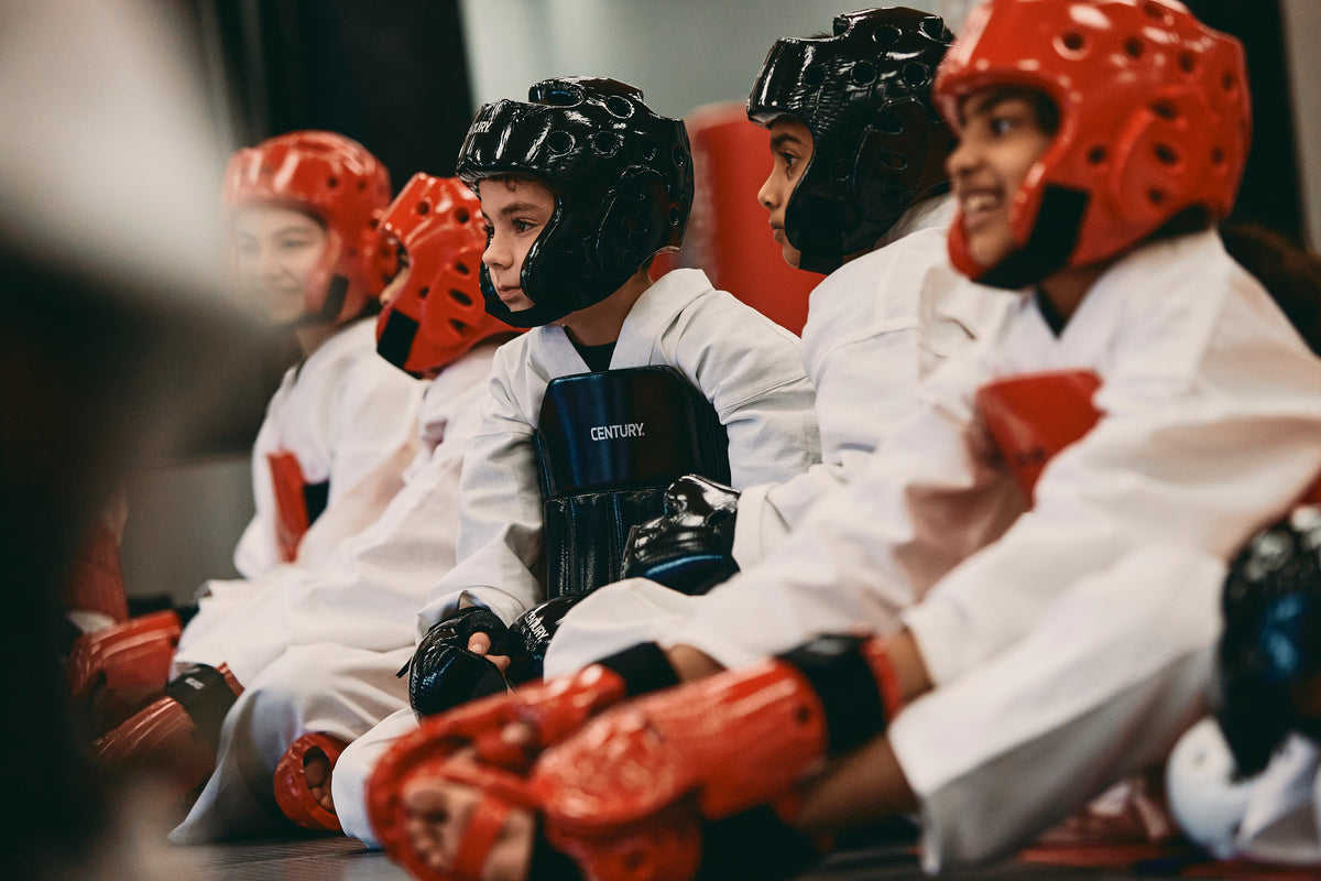 kids sitting in martial arts class