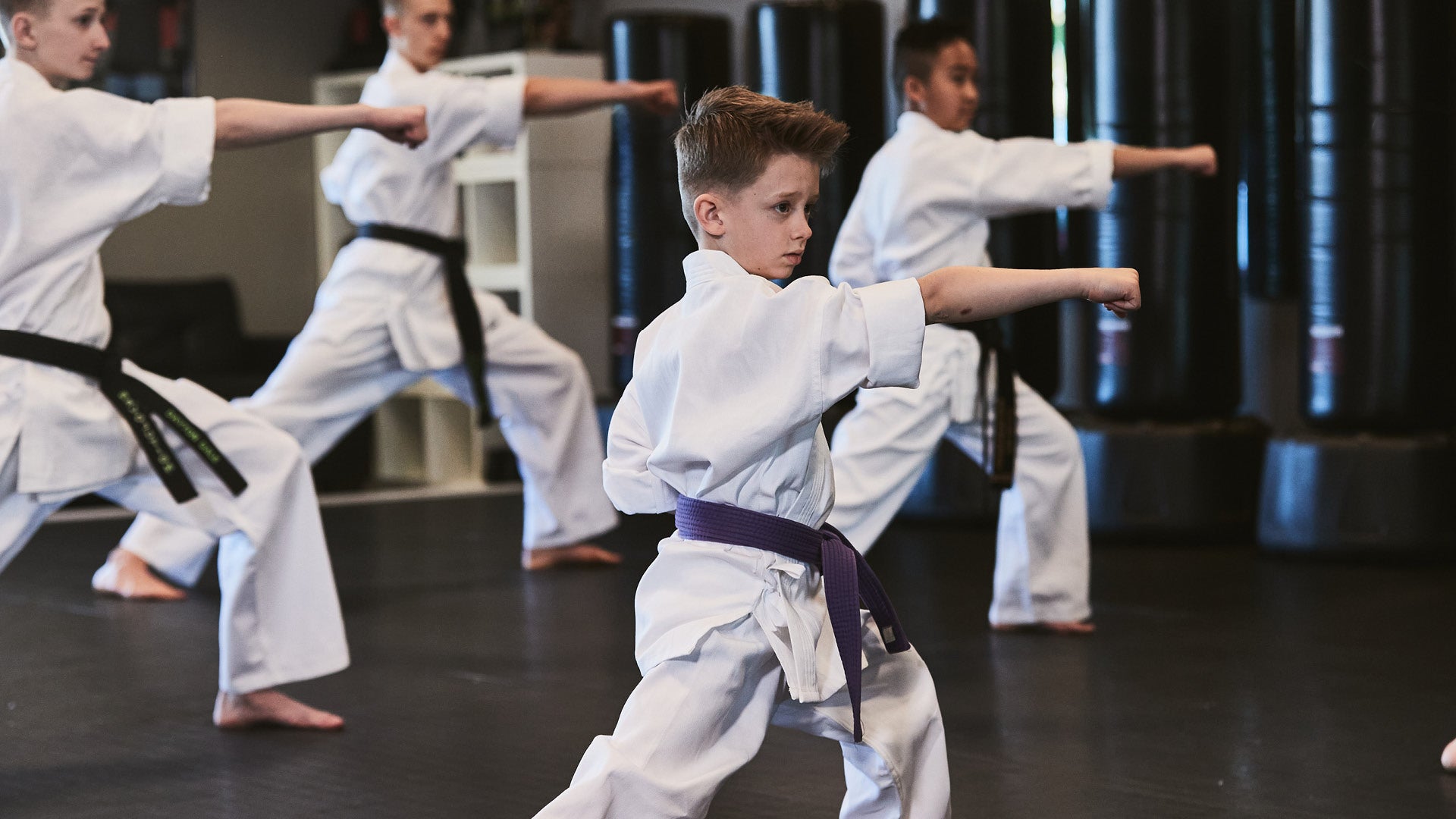 students in century student uniforms training