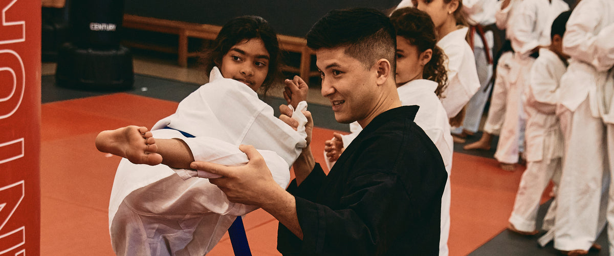 student and teacher in gi uniform