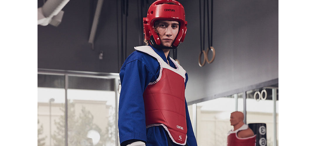 martial artist in class wearing protective gear