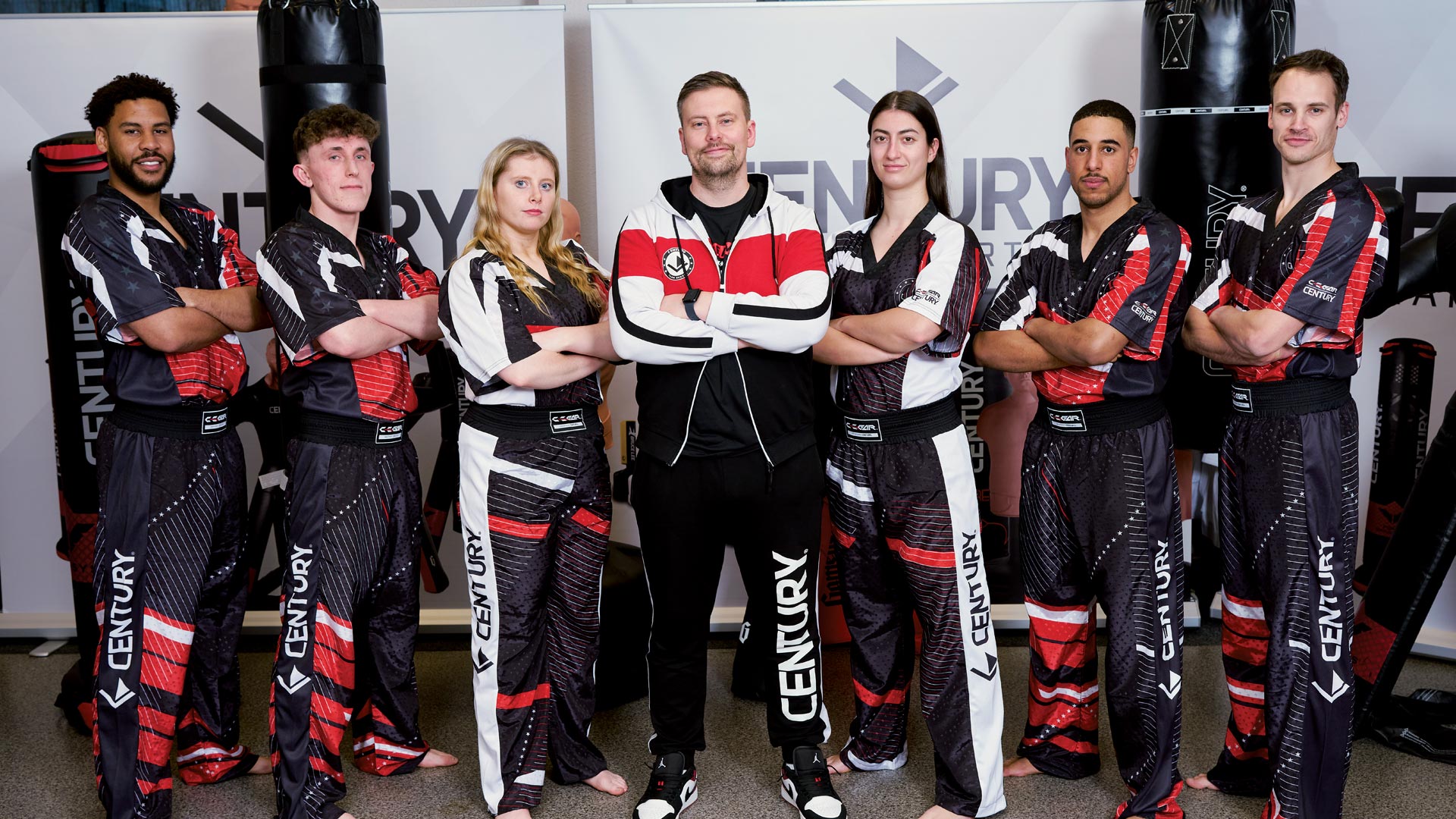 martial artists in century custom uniforms
