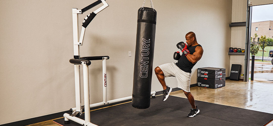 kickboxer training with punching bag